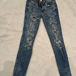 American Eagle Outfitters Ripped Skinny Jeans in Dark Blue